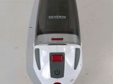 an image of a cordless vacuum cleaner on a white surface