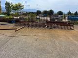 a fence that has been placed in front of a fence