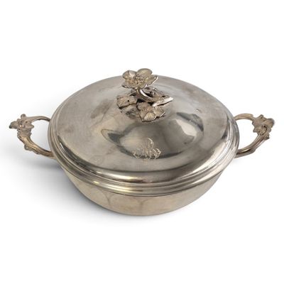 a silver pot with a lid on a white surface