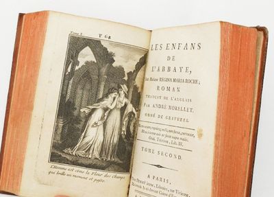 an open book with a picture of a woman on it