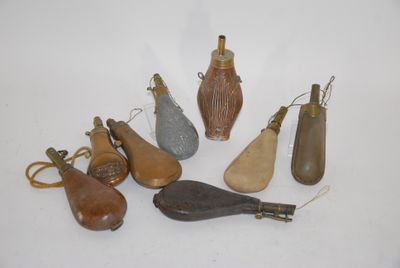 several different types of gourds are arranged on a white surface