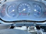 a close up of a car dashboard with a speedometer