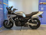 a motorcycle that is parked in a showroom