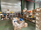 many boxes and boxes on the shelves in the warehouse