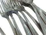 five spoons and two spoons on a white background