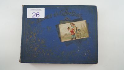 un vieux livre bleu sur lequel figure l'image d'un garçon et d'une fille