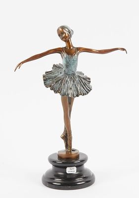 bronze statue of a woman in a tutu on a black base