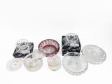 a lot of glass items that are on the table