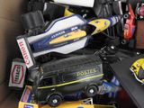 a box full of toy cars and other toys