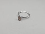 a close up of a ring with a stone in it