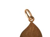 an image of a brown leaf charm on a white background