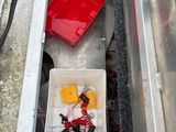 a picture of a boat ' s storage compartment with tools in it