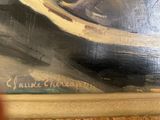 a close up of a painting of a clock on a table