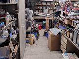 an image of a room filled with lots of clutter