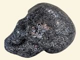 a black rock that has a skull on it