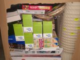 a cardboard box with a bunch of items inside of it