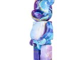 a purple and blue bear statue on a white background