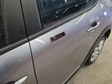 a car that has a sticker on the side of it
