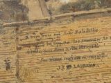 a painting on the wall of a building with writing on it