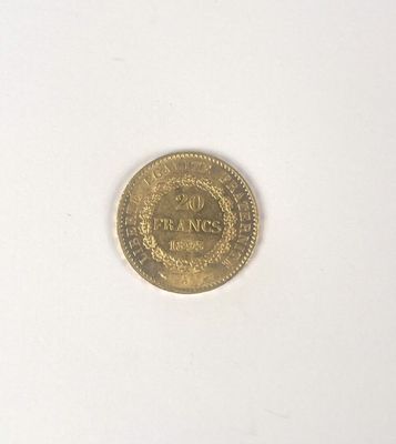 a close up of a coin on a white surface with a white background