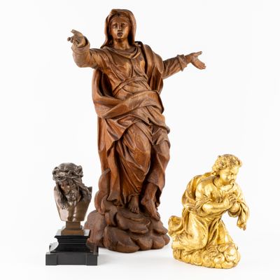 three wooden statues of jesus and a woman on a white background