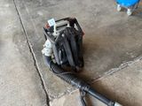 a blower that is sitting on the ground