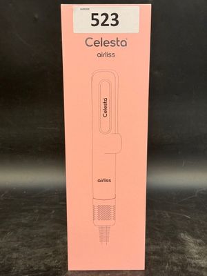 une photo d'une boîte de « Celesto » posée sur une table