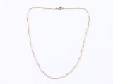 a drawing of a necklace on a white background