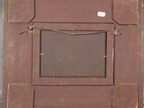 an old wooden picture frame with a window on the outside