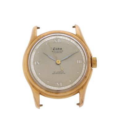 une image d'un gros plan d'une montre-bracelet sur un fond blanc