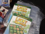 a box of lucky numbers next to a bag of candy
