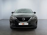 the front of a black nissan murano parked in a white room