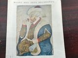 un livre sur lequel figure la photo d'un homme fumant la pipe
