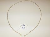 necklace and earring set with blue glass beads on a gold chain