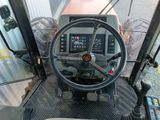 a steering wheel of a tractor with a control panel