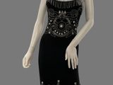 an image of a mannequin dressed in a black dress