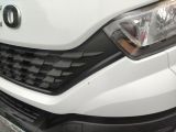 a close up of the front of a white truck