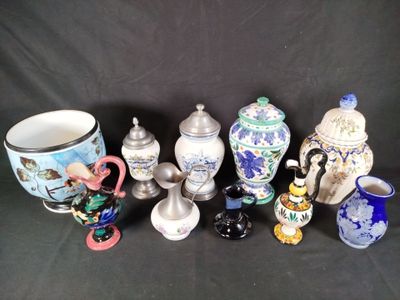 many different types of vases on a black background