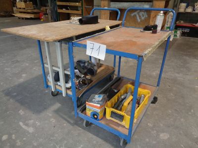 a work cart with tools on it in a warehouse