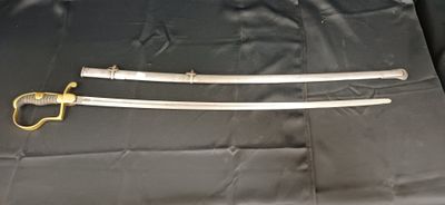 une image représentant une paire d'épées posées sur un tissu noir