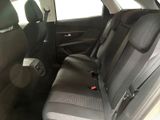 the back seats of a car are empty in the car