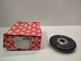 a red and white box sitting on top of a table next to a black and white object