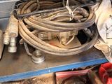 a bunch of hoses that are sitting on a table