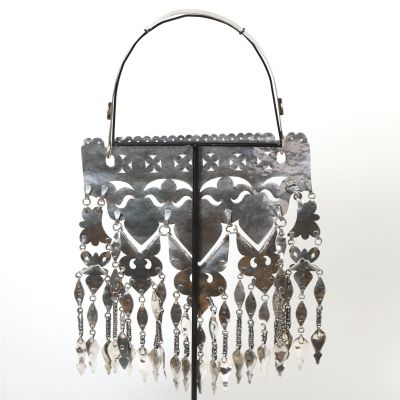 a silver purse with a chain hanging from it