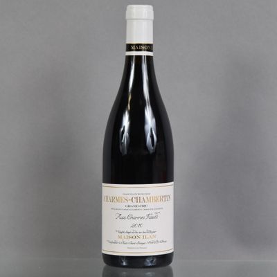 a bottle of wine that is sitting on a table