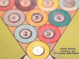 a close up of a game board with a lot of balls on it