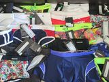 a lot of underwear that are on the couch