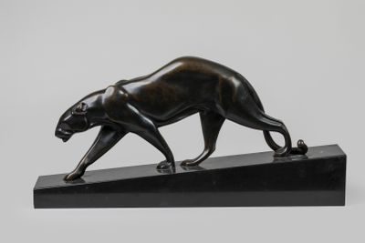 bronze sculpture of a panther on a black marble base