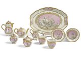 un ensemble d'assiettes, de tasses et de soucoupes en porcelaine rose et blanche