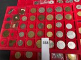 a lot of coins in a red box with a price tag